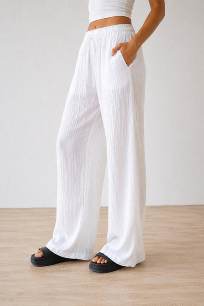 Mouna - Pantalon blanc fraîcheur et élégance minimaliste